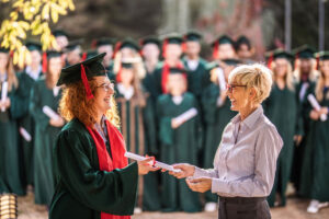 receiving her diploma